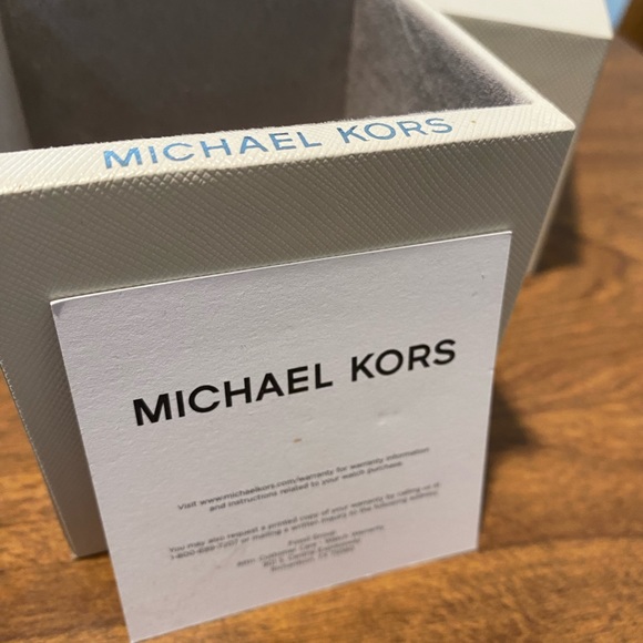 Like new Michael Kors rose gold watch with box and care instructions included. - Picture 2 of 14